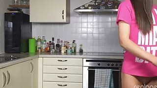 Russian nataly gold rubs her hole with carrot in the kitchen