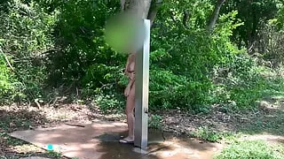 Wifey takes a risky public shower near a busy car park