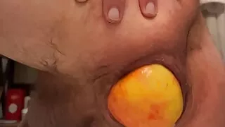 Guy pushes out big apple out of his loose ass