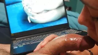 Watching my porn while giving handjob