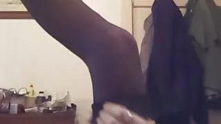 Mellissa puts stockings on her sexy legs