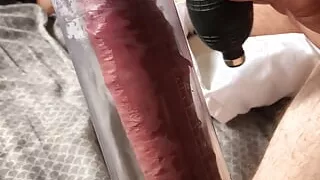 Filling up the penis pump.