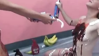 Lusty housewives get bored and play with ice cream toppings on big tits