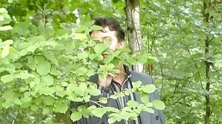 Hot brunette babe from Germany pleasing two cocks outdoors