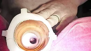 Watch me spurt my cum into my fleshlight from the other end