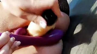 Two dildos and a finger in the ass