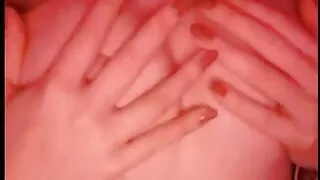 Cutie squeezes her tits and pleases herself