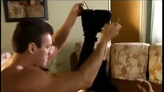 Horny brunette with huge tits rides massive cock on couch