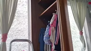 Amanda cleaning the house in dental floss