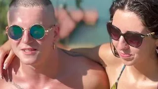 A hot bisexual couple had a sex date in their apartment. She had a blow job with her boyfriend and exposed her pussy