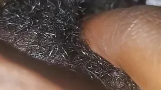 Rubbing her wet tight pussy