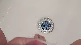 Deprived daddy dumps his cum down the drain