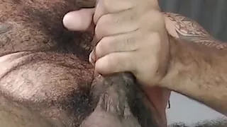 hairy cums playing with hard cock