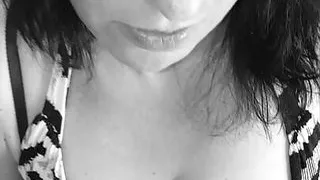 The hot lady fingers her wet pussy