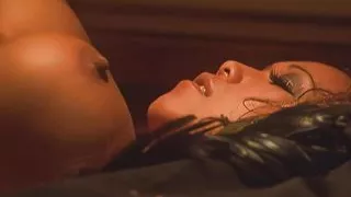 Once in bed the blonde loves eating out the pussy of the Asian lesbian with fake tits