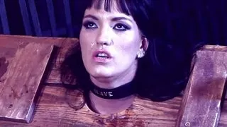 Sir Hector dominate his brunette submissive slut slave girl tied up in pillory with sucking