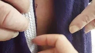 Under the bathrobe...