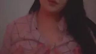 HOT BRUNETTE shows her huge tits in front of the camera