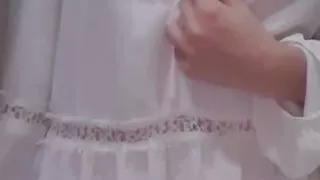 the baby in the bathroom undresses and plays with tits in front of the camera