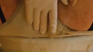 She wears surgical gloves and performs surgery on her asshole.