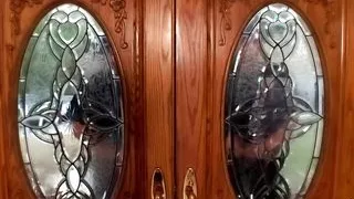 Sex slave gets his big cock pleasured by two stunning MILF babes in latex outfits