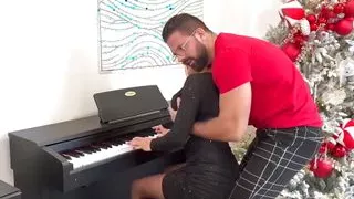 Alice Wild studies her piano teacher's fingering!