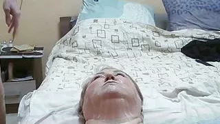 after multiple ejaculations, the mother-in-law's face is all in semen