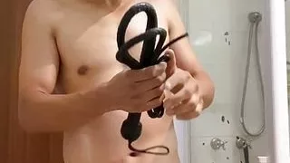 Master learns to use his new whip, testing on a poor slave.