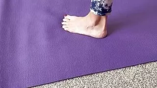 Jerking to wife's feet while she stretches