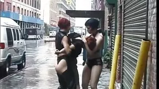 Two lusty whores loves to take advantage of a brunette outdoors