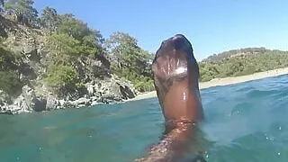 red toes and stocking in the sea