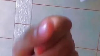 A big cumshot in the shower after a good handjob