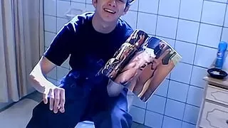 Stud gay Ian Madrox lights up cigar and tugs cock with hand