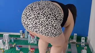 Giantess destroying a city