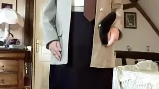 In military uniform with a brown tie