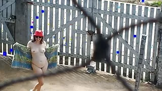 My wife goes outdoor wearing shoes, a towel and a hat. She walks naked outside.