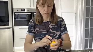 Seductively Eating an orange