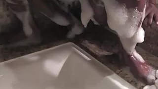 Since her man is not around the curvy black babe uses her sex toy vigorously