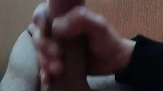 I masturbate on the balcony of my house that overlooks the main street while my neighbor looks out to see what I'm doing.