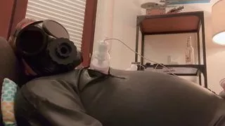 Rubber Gimp Hendrik Gransow jerks off the cum out of his cock