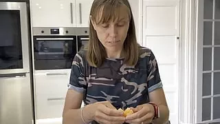 Seductively Eating an orange