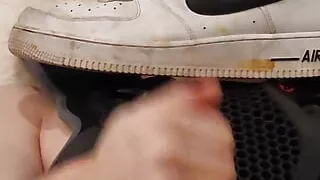 Nicely played in bed with my sneakers on the cock