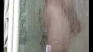 I spy on my husband while he takes a shower....it made me want to fuck watching him masturbate