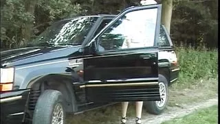 Slim German babe fingering her moist twat in the woods