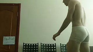 Solo sports guy doing warm-up and sports, athletic muscular slim young man straight natural wrestler, muscular body