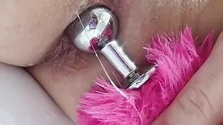 The butt plug is slipping inside me...