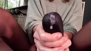 Handjob using black pantyhose on his hard cock