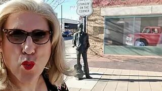 Mrs Samantha 'standing on the corner in Winslow Arizona' and driving her red Mustang Convertible