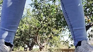 Peeing in an orange field