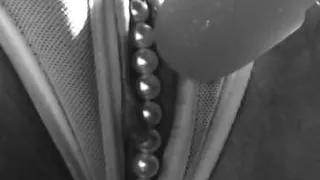 Teasing her pussy - touching her lips with a dildo